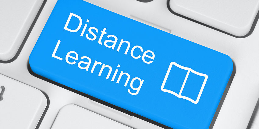 keyboard showing distance learning