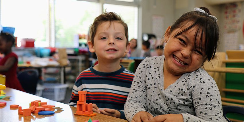 kindergarten boy and girl smiling