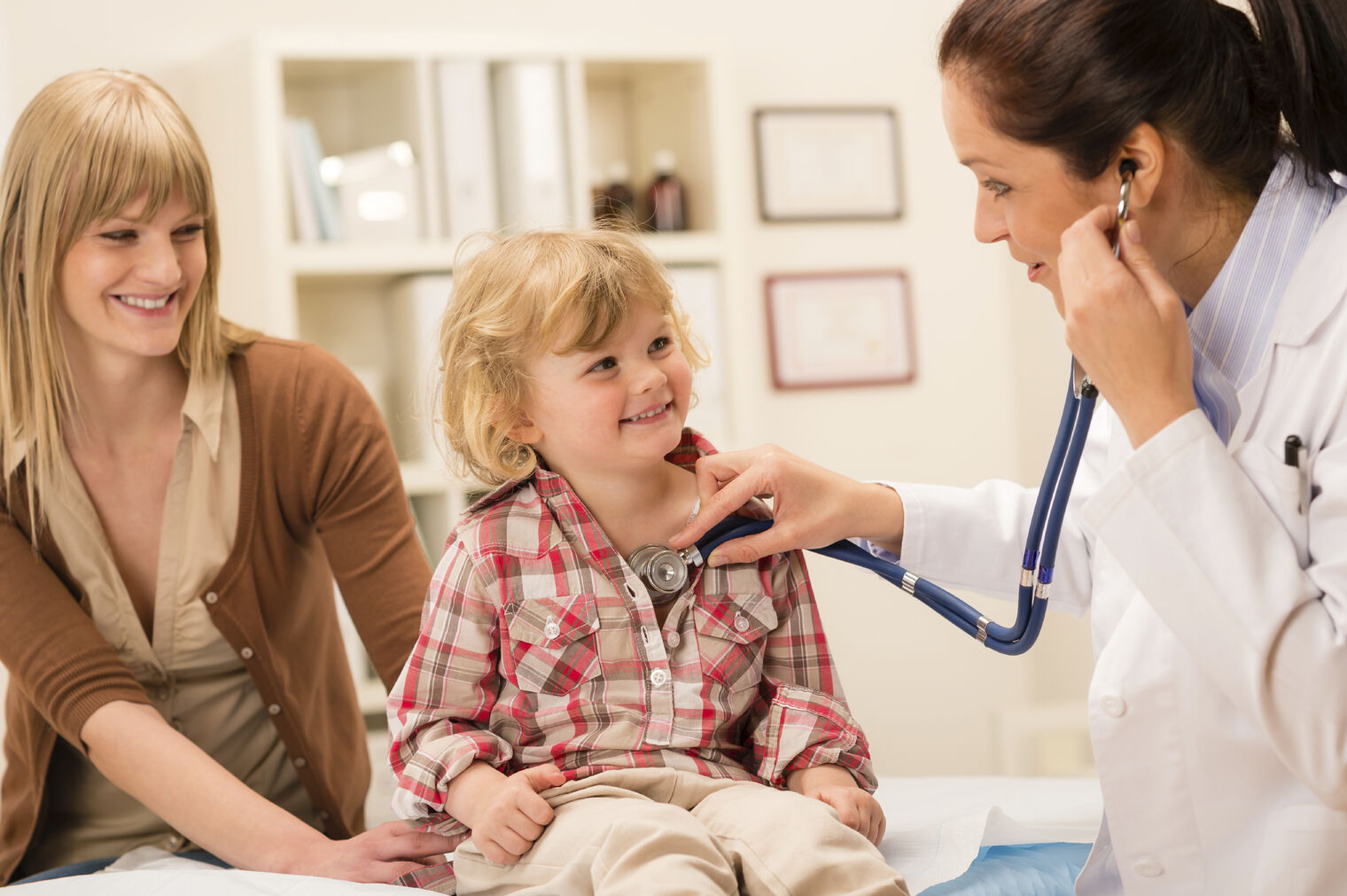 nurse with mother and child
